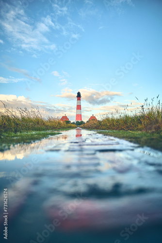 Historic Pathway to Lighthouse at north sea coast. High quality photo