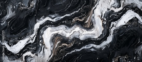 Smooth black and white marble granite with elegant abstract patterns for interior decoration.