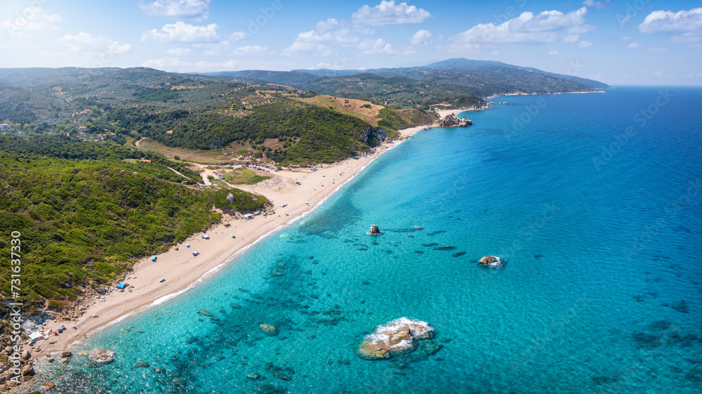 Aerial view of the beautiful beach of Melani, Mount Pelion, Greece, with turquoise sea and lush vegetation