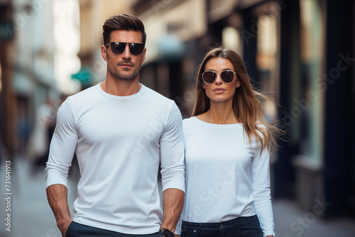 Man and woman wearing blank white long sleeve t-shirt photo