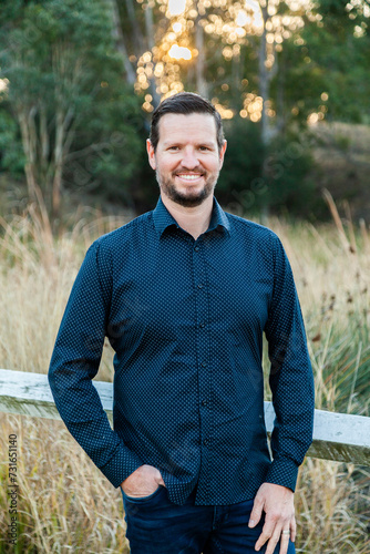 Portrait of well dressed man looking directly at the camera