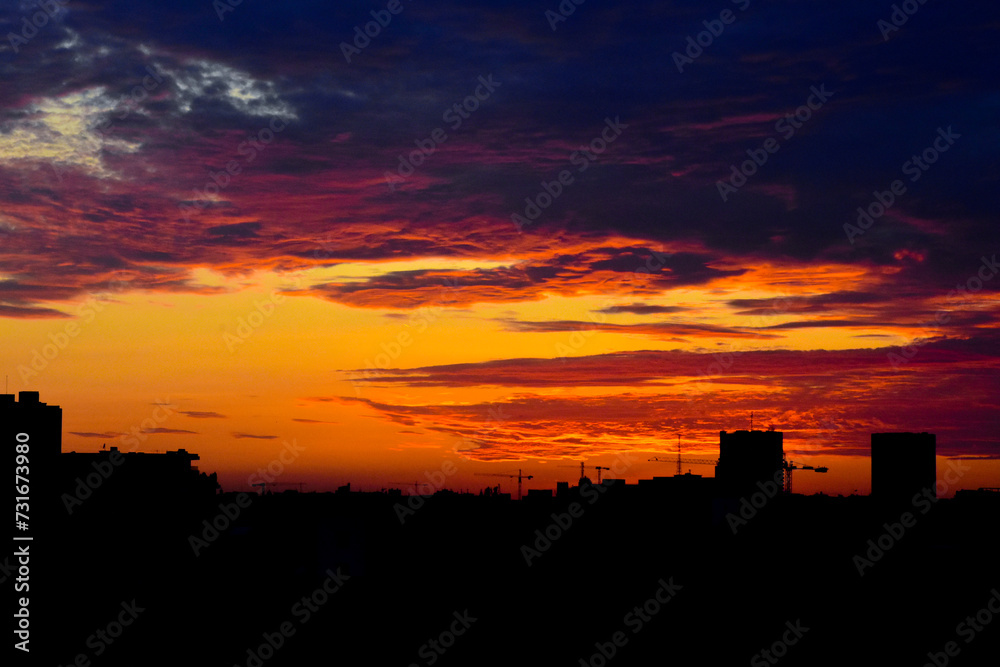 Bucharest city skyline view seen from Piata Muncii at sunset. Bucharest city silhouette at sunrise, sunset, Romania