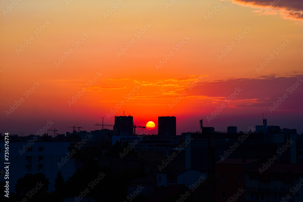 Bucharest city skyline view seen from Piata Muncii at sunset. Bucharest city silhouette at sunrise, sunset, Romania