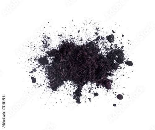 Black Soil Texture. Pile of Black Cultivated Soil with Plant Remains, Lumps and Roots. White Background. Garden Soil Scatter Loosely on a Light Ground. photo