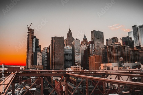 Scenic shot of skyscrapers in New York at sunset © Wirestock