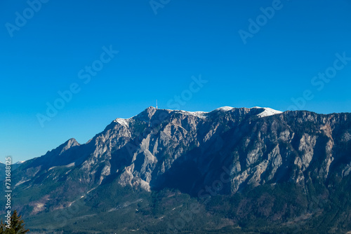 Panoramic view of majestic mountain peak Dobratsch seen from Dreilaendereck (Pec, Often, Monte Forno) in untamed Karawanks, Carinthia, Austria. Alpine landscape in spring in Austrian Alps. Wanderlust © Chris