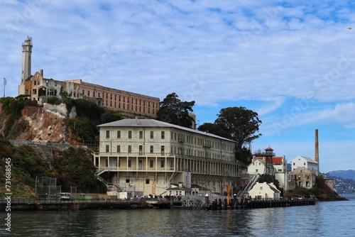 Scenic view of old buildings against a cloudy blue sky on Alcatraz Island, San Francisco