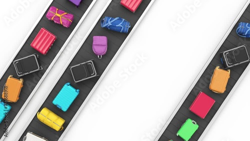 Multicolored luggage on conveyor belt top view. Airport ravel suitcases and baggage concept.
