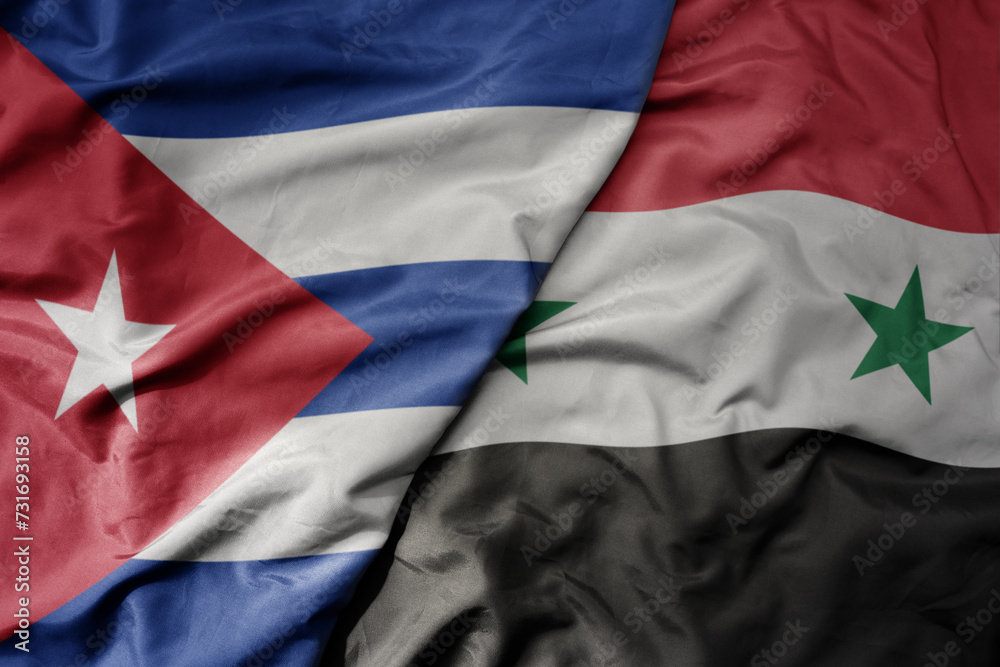 Φωτογραφία big waving national colorful flag of syria and national flag of cuba