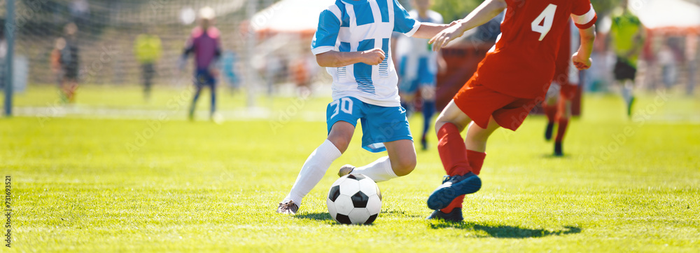 Children Kicking Soccer School Tournament Match. Children Playing Sports Game. Running Footballers. Young Athletes Compete in Football Game Children Kicking Soccer School Tournament Match. Children Playing Sports Game. Running Footballers. Young Athletes Compete in Football Game