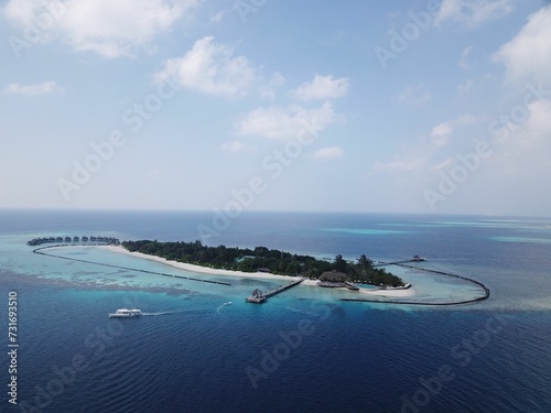 Fototapeta Naklejka Na Ścianę i Meble -  Aerial shot of the Komandoo island in the Maldives.
