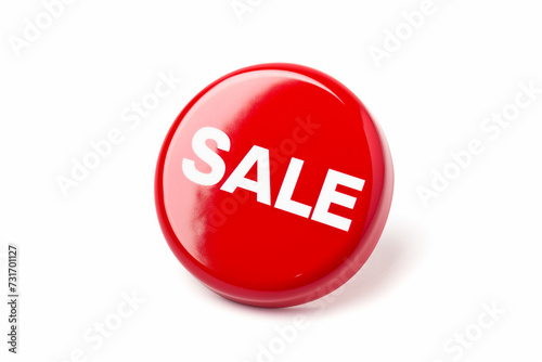 a vibrant red button with the word sale isolated on a bright white background signifying a promotional event