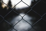 Metal mesh wire fence with blur background