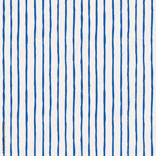 Hand drawn vertical striped pattern. Blue lines on white background. Thin stripe