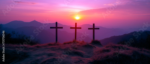 Crucifixion and Resurrection of Jesus at sunset. Three wooden crosses against beautiful sunset in the mountains. Catholicism symbols. Easter concept.