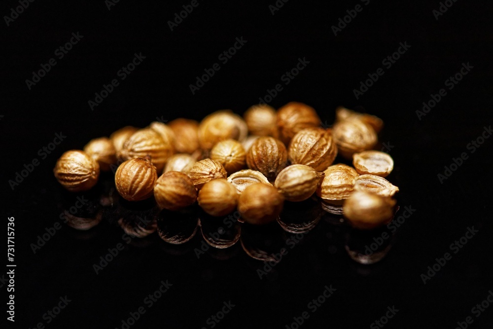 Pile of Coriander isolated on a black background Pile of Coriander isolated on a black background
