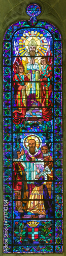 ANNECY  FRANCE - JULY 11  2022  The modern stained glass with the St. Francis of Sales in St. Pierre Cathedral from 20. cent. 