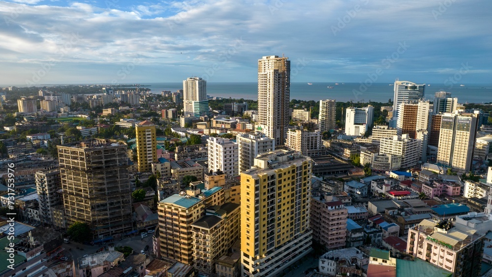 Naklejka premium View of Dar es Salaam, Tanzania, showing a vibrant cityscape with tall buildings