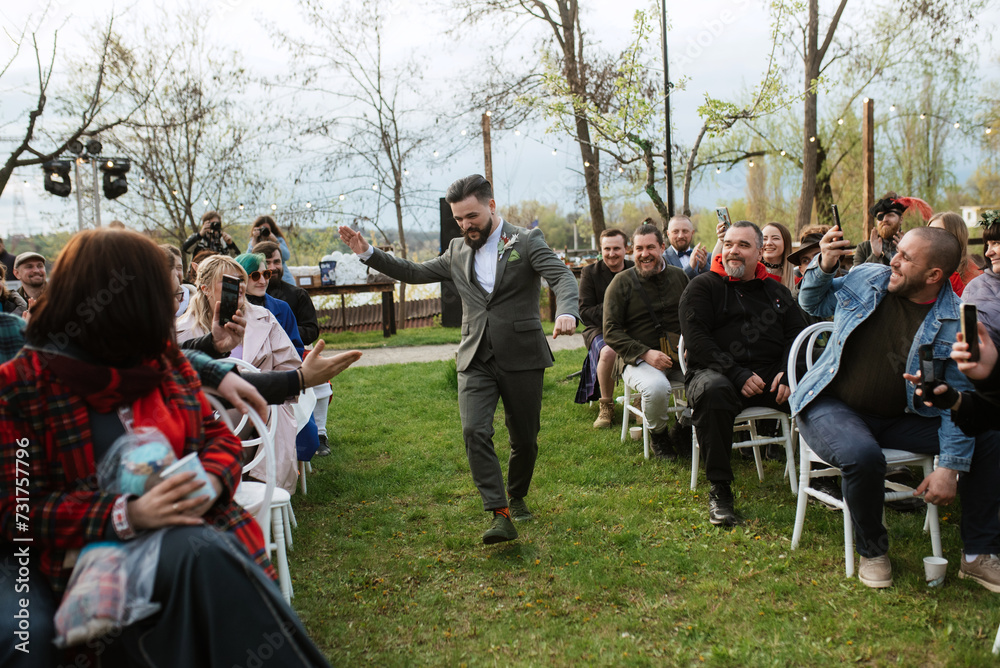 wedding ceremony of the newlyweds in a country cottage wedding ceremony of the newlyweds in a country cottage