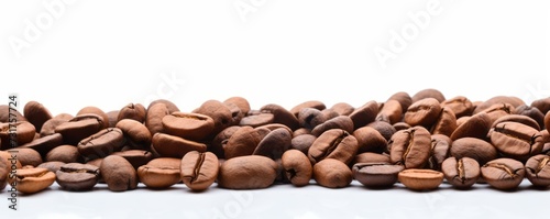 Coffee Beans Scattered on a White Background - Close-Up Isolated View