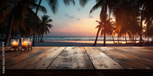 A wooden deck with a sunset in the background . 