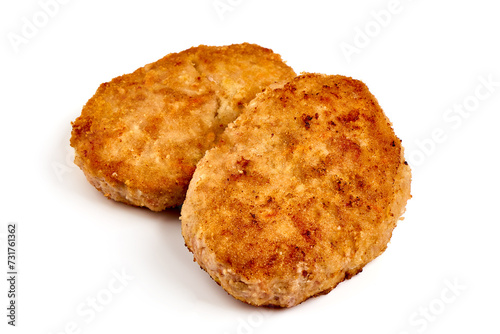 Fried pork schnitzels in breadcrumbs, isolated on white background.