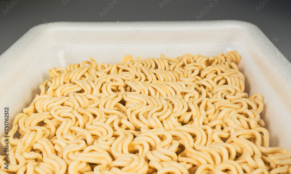 Fast food, Instant noodles, in a plastic plate, close-up. Fast food, Instant noodles, in a plastic plate, close-up.