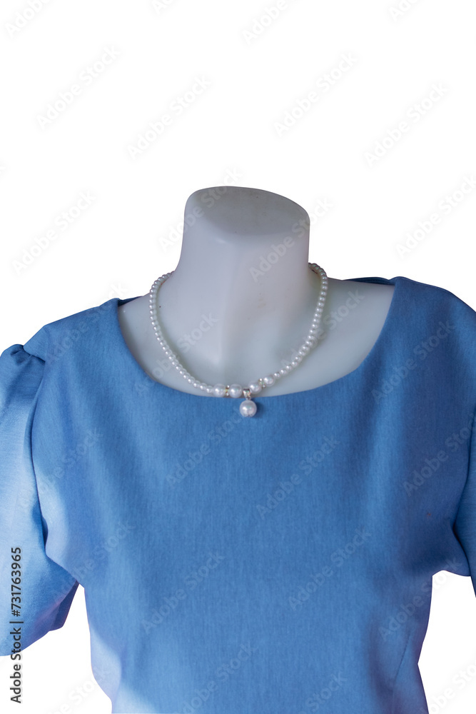 mannequin is wearing a blue shirt and pearl necklace. mannequin is wearing a blue shirt and pearl necklace.