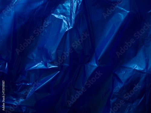 Dark blue plastic bag texture for environmental background.