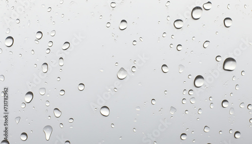 Realistic water drops on white background. Drops of water condensed, isolated. Realistic raindrops on a white background. Liquid, H2O, hydrogen. Drops of water in motion.