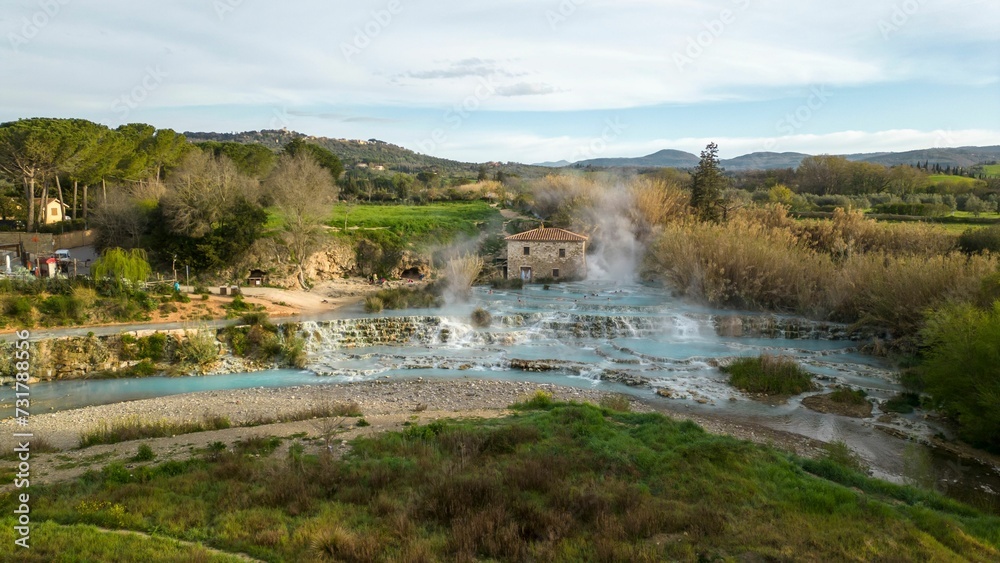 Idyllic landscape features a Saturnia bath, Italy