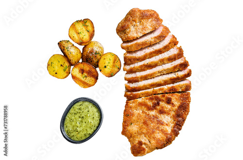 Homemade breaded german weiner schnitzel with potatoes and salad.   Isolated, Transparent background.