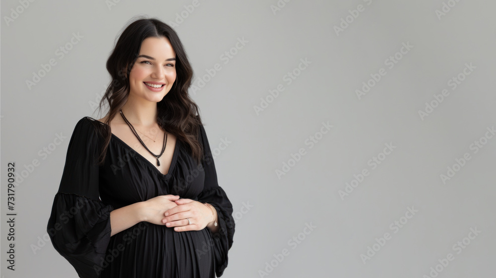 Brunette pregnant woman with pregnancy belly, in soft black clothes Brunette pregnant woman with pregnancy belly, in soft black clothes