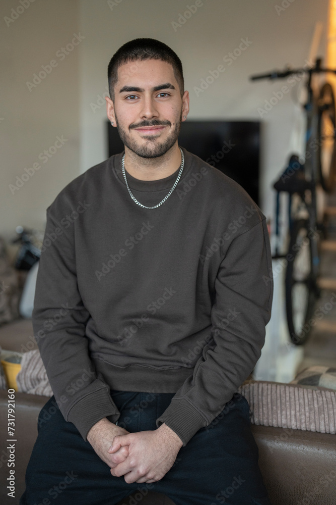 Fototapeta premium Portrait of smiling young man at home