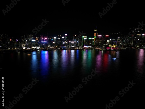 Photography Aerial view of Hong Kong skyline illuminated at night in China