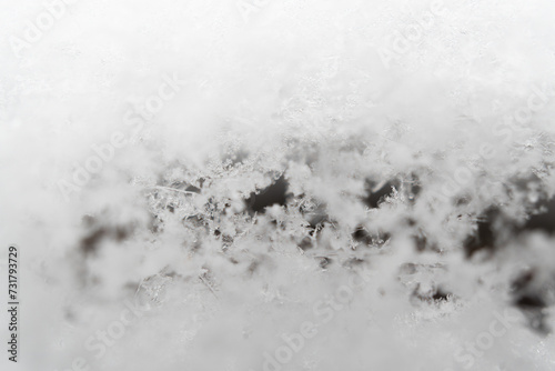 Snow texture with snowflakes and ice crystals © vinbergv