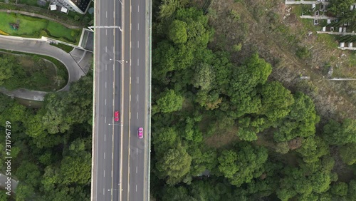 Top down drone footage of cars driving on a bridge near Santa Fe borough in Mexico City, Mexico photo