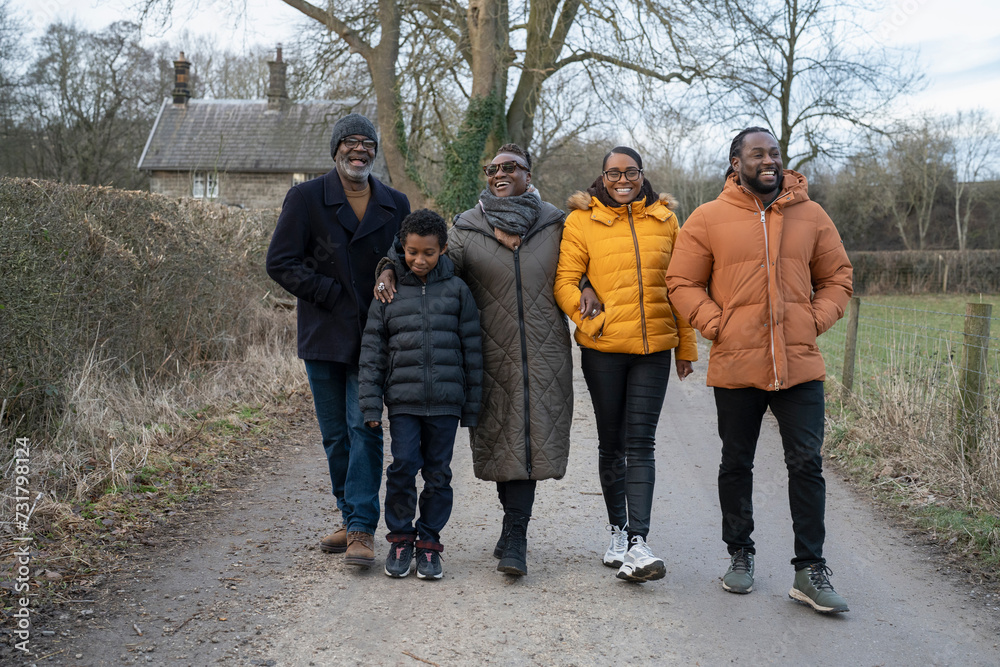 Three generation family walking together in rural area Three generation family walking together in rural area
