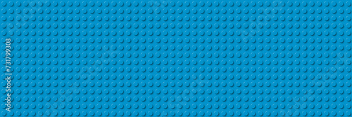 Blue plastic construction plate banner. Closeup plastic toy block. Abstract vector background. Seamless modern design