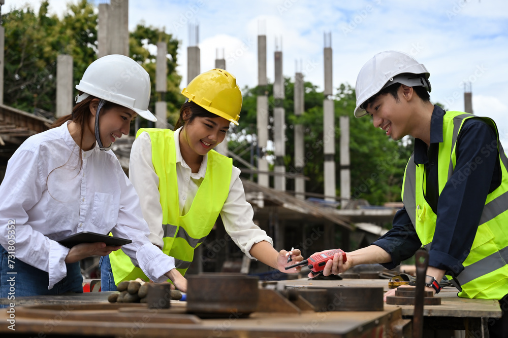 Diversity workers people meeting, discussion in a building project, Success teamwork, professional engineering people, outdoors Diversity workers people meeting, discussion in a building project, Success teamwork, professional engineering people, outdoors