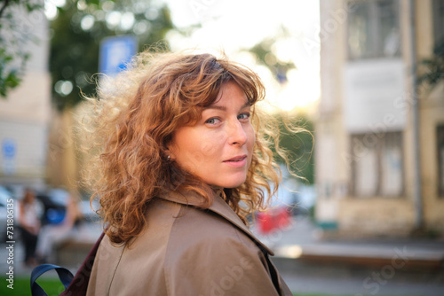 Face, smile and portrait of a woman happy in a park in summer for beauty, excited and confident in nature. garden and female person or model outdoor with freedom, happiness, style. High quality photo