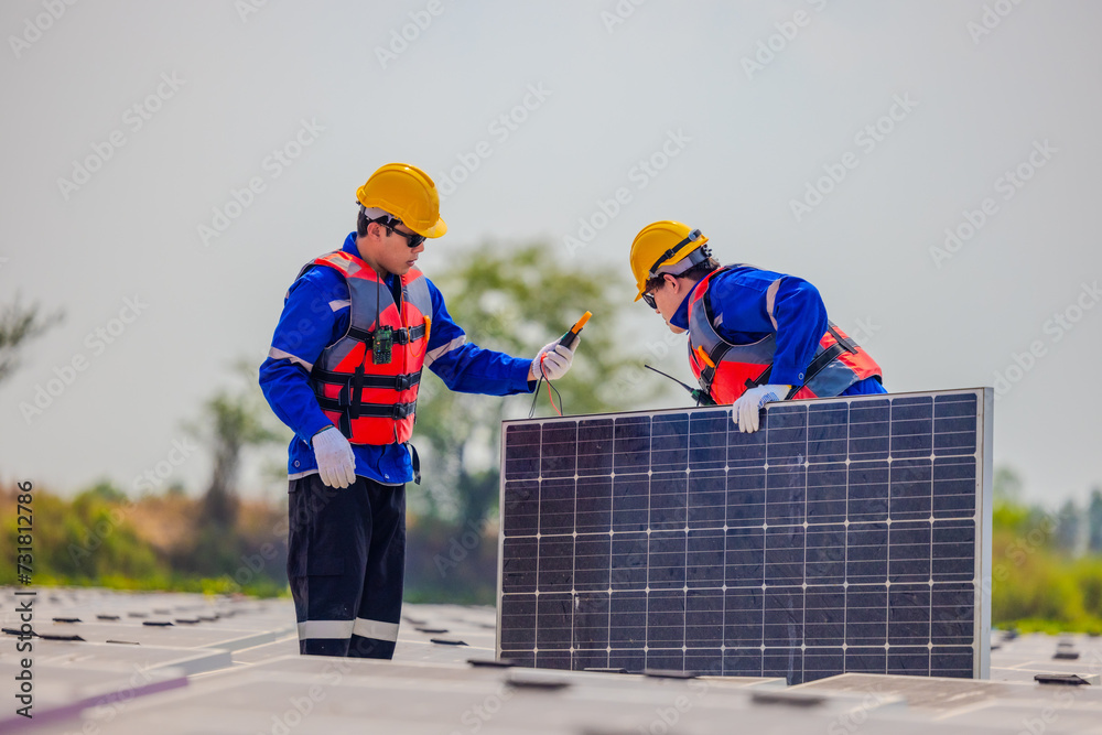 Technicians check floating solar farm wiring, polarity, and grounding for reliability and safety Technicians check floating solar farm wiring, polarity, and grounding for reliability and safety