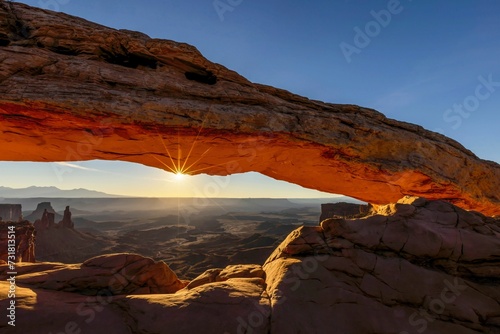 Sunrise In Mesa Arches National Park, with an arch silhouette © Wirestock