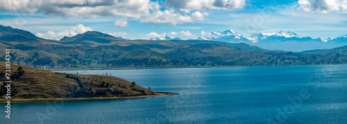 Fototapeta Naklejka Na Ścianę i Meble -  Breathtaking views of the shores of the Titicaca Lake with the mountains of the Cordillera Real in the background, Bolivia