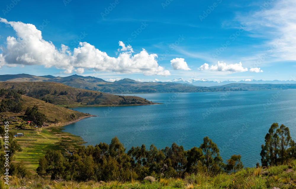 Breathtaking views of the shores of the Titicaca Lake mountains of the Cordillera Real in the background, Bolivia