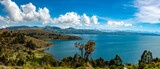 The shores of the Titicaca Lake with the  mountains of the Cordillera Real in the background, Bolivia