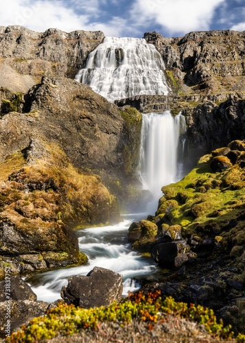 Fototapeta Naklejka Na Ścianę i Meble -  Vertical image of Dynjandi, a majestic waterfall situated in Iceland