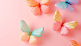 Colorful Inflatable Butterflies on Soft Pink Background , Vibrant Summer Vibe