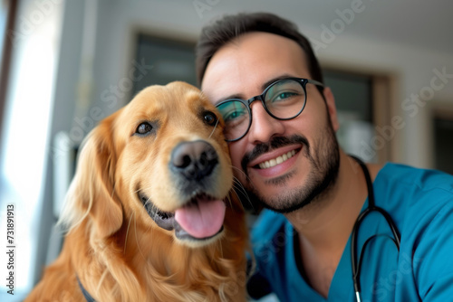 Young veterinarian with glasses hugging a dog in the clinic. Dog medicine theme 