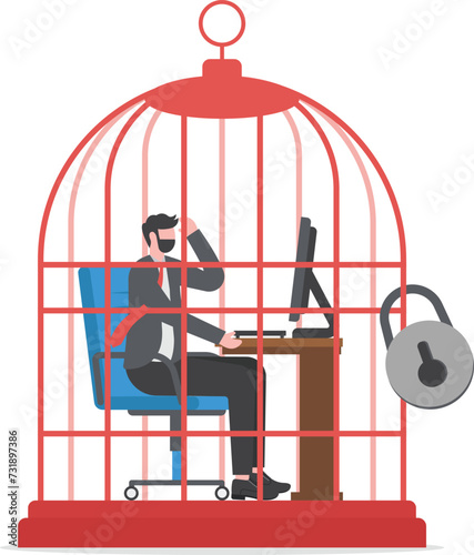 Stress at work concept. businessman working at desk trapped inside birdcage

